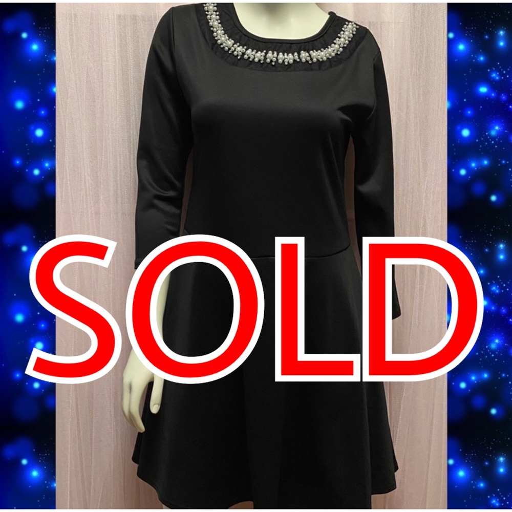Black dress with pearls ornate collar